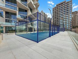 Chic 1BR Retreat with Pool & Balcony JVC