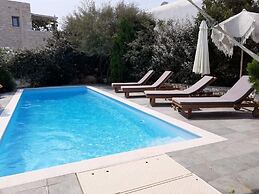 THEROS CASA LOGARAS