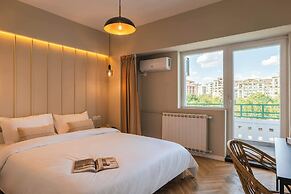 New Unirii Apartments by Olala Homes