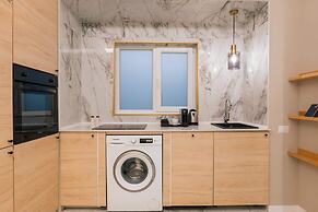 New Unirii Apartments by Olala Homes