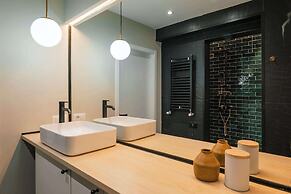 New Unirii Apartments by Olala Homes
