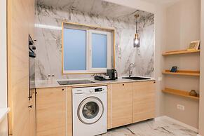 New Unirii Apartments by Olala Homes