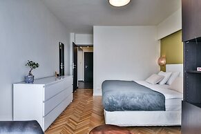 New Unirii Apartments by Olala Homes