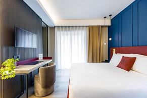 MH SUITES PLEBISCITO