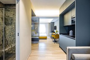 MH SUITES PLEBISCITO