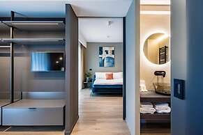 MH SUITES PLEBISCITO