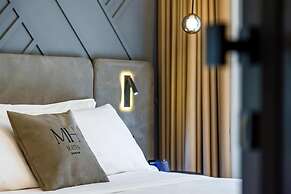 MH SUITES PLEBISCITO