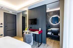 MH SUITES PLEBISCITO