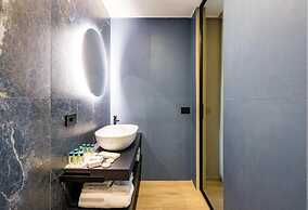 MH SUITES PLEBISCITO