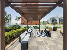 Superhost Modern 1BR in Azizi Riviera