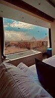 Pharaonic Pyramids Inn