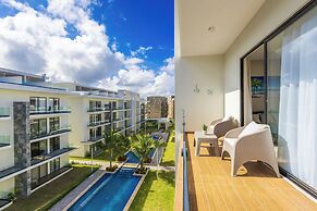 Stylish 1BR Apartment – Pool Access, Close to Beach