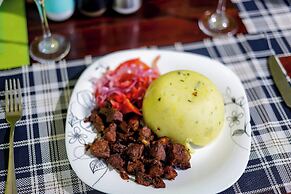Calm Breeze Resort Rwanchege