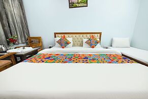Fabhotel Royal Om River Resort