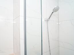 Comfy White Studio At Ciputra World 2 Apartment