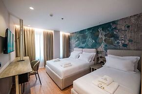 Ermes Deluxe Triple Room
