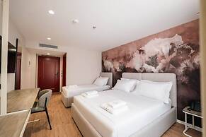 Ermes Deluxe Triple Room