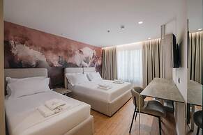 Ermes Deluxe Triple Room