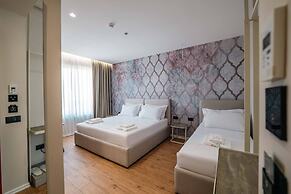 Ermes Deluxe Triple Room