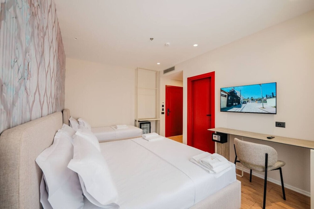 Ermes Deluxe Triple Room