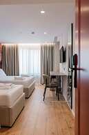 Ermes Deluxe Triple Room