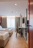 Ermes Deluxe Triple Room