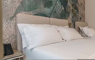 Ermes Deluxe Triple Room