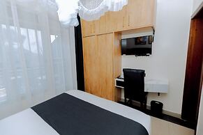 One Click Cozy Suites