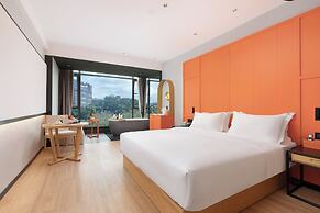 Global Village Riverside Hotel