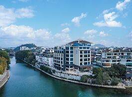 Global Village Riverside Hotel