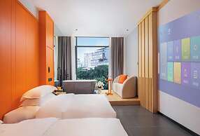 Global Village Riverside Hotel