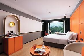 Global Village Riverside Hotel