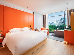 Global Village Riverside Hotel