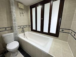 Spacious 2BR Condo - 3 Balconies & Green Views