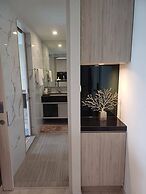 Luxury Sea View 1BR Rooftop Infinity Pool & Gym