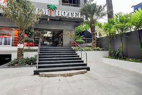 Fabhotel Palm Tree
