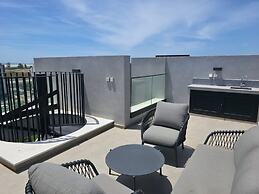 Rooftop Sunset Garden by Staycom