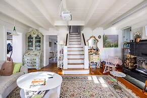 Charming Whimsical Historic River Home