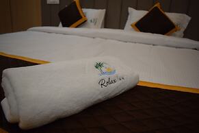 Relax Inn Suites & Rooms