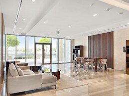 Bright 1BR Escape w Balcony Building Pool