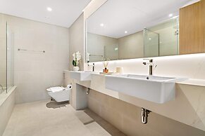Bright 1BR Escape w Balcony Building Pool