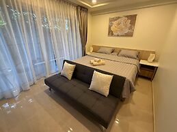 1BR Condo Gym Sauna Pool 650m Beach C271