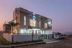 ELIVAAS White House 4BHK Villa With Pool