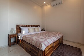 ELIVAAS White House 4BHK Villa With Pool