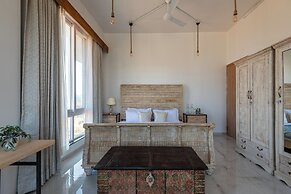 ELIVAAS White House 4BHK Villa With Pool
