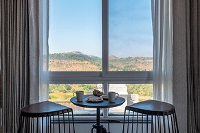 ELIVAAS White House 4BHK Villa With Pool