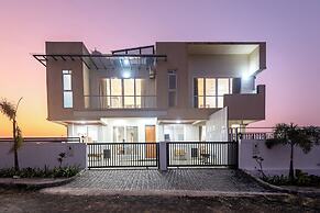 ELIVAAS White House 4BHK Villa With Pool
