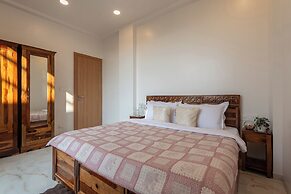 ELIVAAS White House 4BHK Villa With Pool