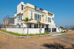 ELIVAAS White House 4BHK Villa With Pool