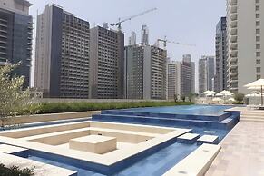 Elegant Reva 1BR - Pool & Gym